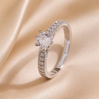 Essential white gold ring with embedded zirconia