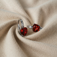 Silver hoop earrings with ruby heart
