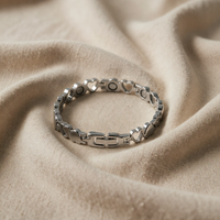 Refined white gold bracelet with heart pendant